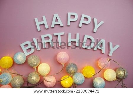 Happy Birthday alphabet letters on pink background