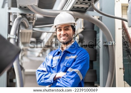 Asian man engineer of mechanical plumbing and sanitary system. Worker has proudly his job. Concept Engineer Operating and control in Factory with safety.