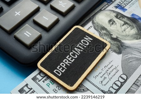 Plate with sign depreciation on the cash. Royalty-Free Stock Photo #2239146219