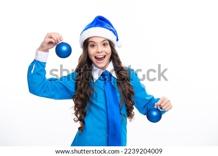 Christmas kids, New Year celebration concept. Portrait a teenage girl child hold christmas ball bauble isolated on white background.