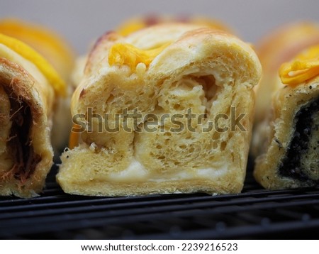 Homemade mango bread filled with custard cream in closeup view