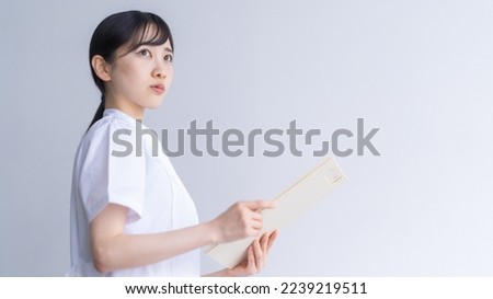 Woman in white nurse clothes
