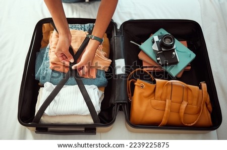 Travel suitcase, bedroom and hands of woman packing for Europe holiday, vacation or adventure tourist journey. Hospitality, hotel bed and photographer with luggage bag, clothes and camera in Madrid Royalty-Free Stock Photo #2239225875