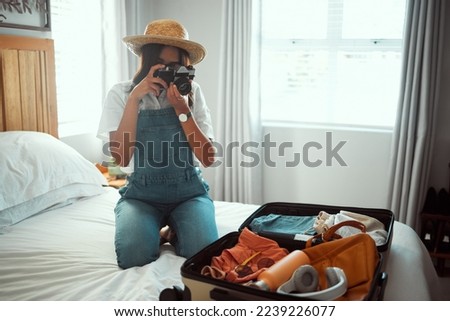 Woman, photographer or camera picture of suitcase for summer holiday, vacation break or content marketing for creator blog. Travel influencer, digital photography or luggage objects in hotel bedroom