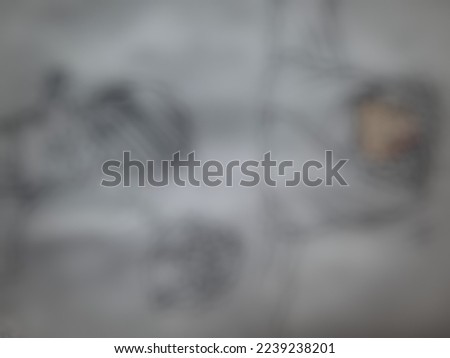 Defocused or blurred abstract background of cartoons that was drawn on the white large paper