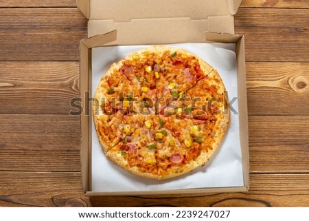 top view fresh pizza with bacon toppings in a box