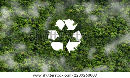 Recycled signage concept amidst the natural beauty of the natural environment. Ecological metaphor for ecological waste management and sustainable and frugal lifestyles. Royalty-Free Stock Photo #2239268809