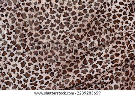 Leopard or cheetah print wavy fabric, a popular fabric for making women's dresses, skirts