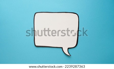 Speech bubble on a blue background. Comic cloud with a place for text Royalty-Free Stock Photo #2239287363