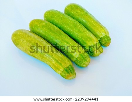 Zucchini vegetable courgette baby marrow hybrid summer squash an edible vining herbaceous plant food closeup view image stock photo