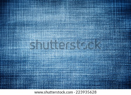 Perspective and closeup view to abstract space of empty light blue natural clean denim texture for the traditional business background in cold bright colors with diagonal shift tilt lines and stitches Royalty-Free Stock Photo #223935628