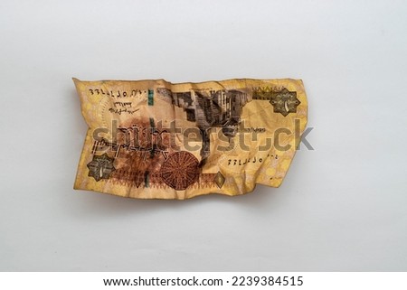 Crispy Egyptian pound isolated on a white background
 Royalty-Free Stock Photo #2239384515