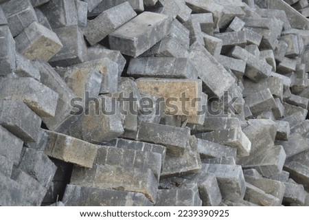 background patterns, shapes and textures from piles of used paving block material