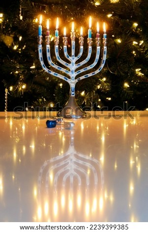 On Hanukkah, nine candles are lit in a menorah.