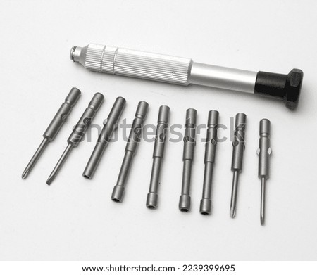 Set of Mini Screw Driver with Different size heads Royalty-Free Stock Photo #2239399695