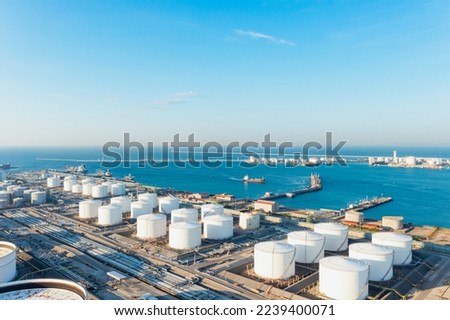 Aerial view or oil terminal is industrial facility for storage tank of oil and LPG Petrochemical. oil manufacturing products ready for transport and business transportation, LPG Tank, CNG tank Royalty-Free Stock Photo #2239400071