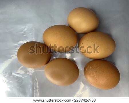 six of an eggs with brown colour