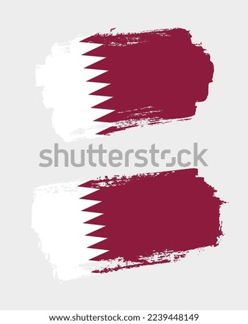 Set of two creative brush painted flags of Qatar country with solid background