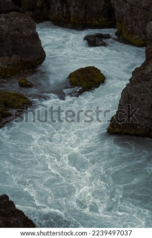 Fast mountain river between cliffs landscape photo. Beautiful nature scenery photography with rocks on background. Idyllic scene. High quality picture for wallpaper, travel blog, magazine, article