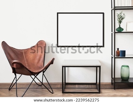 Blank picture frame mockup on a wall. Horizontal orientation. Artwork template in interior design Royalty-Free Stock Photo #2239562275