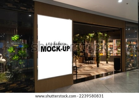 Mockup advertising LED Screen Install at front of restaurant or shop with clipping path, empty space for insert your text, announcement, multi-media content and advertisement in shopping mall