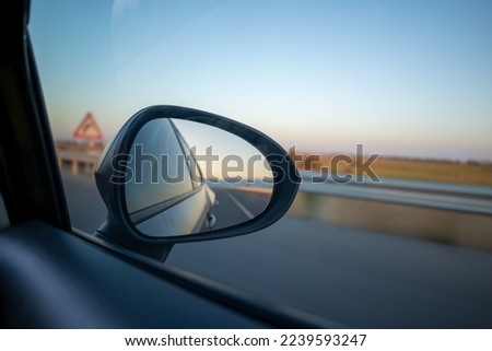 The road from the vehicle's mirror Royalty-Free Stock Photo #2239593247