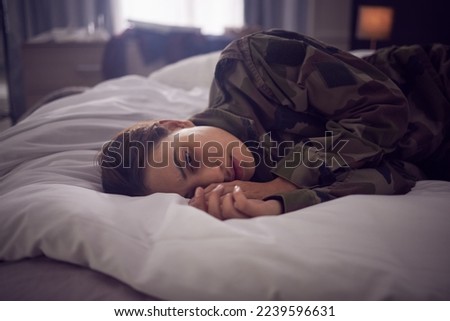 Thinking, tired and depression of a woman with mental health, anxiety or insomnia problem. Fatigue, stress and sad person in a bedroom bed feeling depressed ready for sleep on a house pillow Royalty-Free Stock Photo #2239596631