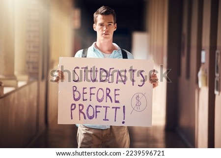 Protest, education and man with poster at university for freedom from student loans, debt and free learning. Justice, equality and student with sign for support at college, school and academic campus