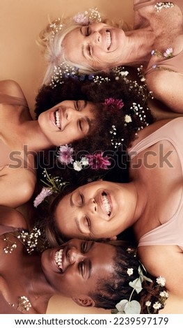 Top view, women diversity or faces with flowers on studio background in empowerment, divine feminine energy or self love. Smile, happy or skincare beauty models with plants, leaf or organic spa glow Royalty-Free Stock Photo #2239597179