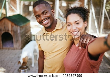 Love, dog or couple of friends take a selfie at an animal shelter or adoption center for homeless dogs. Pets, face portrait or black woman with a fun black man taking pictures as a happy black couple
