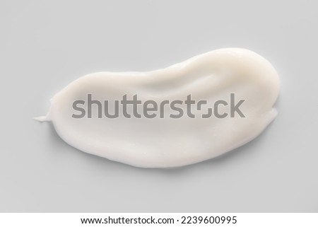 Sample of moisturizing cream on light background