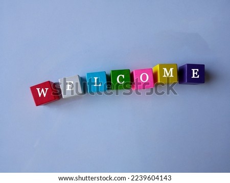 Top view, Colorful wooden block toys cids isolated blurred gray background for stock photo. Concept of welcome making process, logical thinking. play game board, business finance