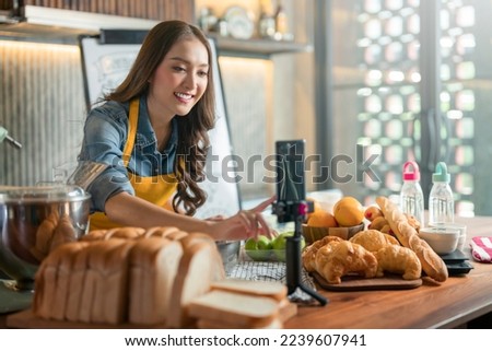 Asian Female Chef Talks about Ingredients, Teaches to bake bread. Online Video Class, Streaming Service of e-Learning Video Course.  bread Recipe Preparation record live online social media in studio Royalty-Free Stock Photo #2239607941