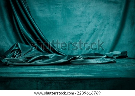 Green luxury velvet background in moody light and free space