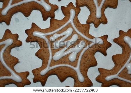 Beautiful homemade gingerbread decorated with glaze, close up