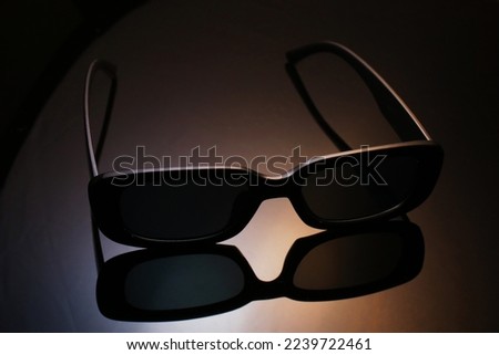 A pair of glasses with packshot photography technique.