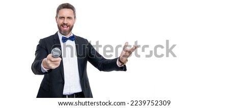 man speaker wear tuxedo in studio with copy space. speaker man speaking in microphone. Royalty-Free Stock Photo #2239752309