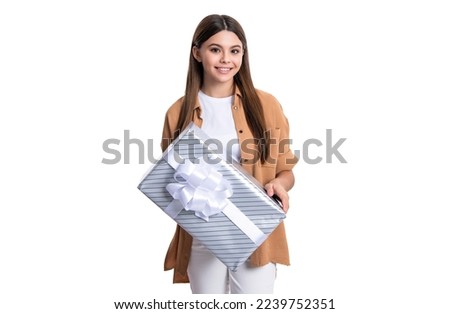 cheerful teen girl with birthday gift isolated on white background. teen girl holding birthday gift