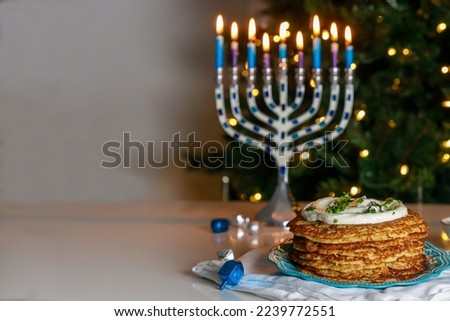 Latkes are a delicious traditional Jewish food dish for Hanukkah.