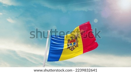 Moldova Flag on pole for Independence day. The symbol of the state on wavy cotton fabric.