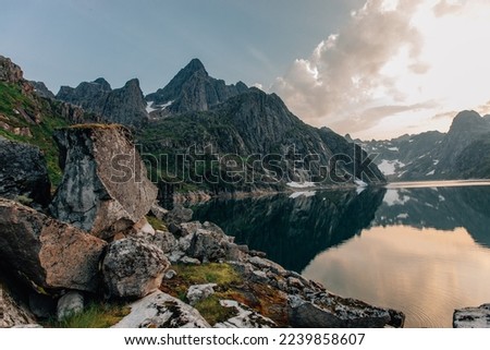 The Scandinavian Mountains or Scandes, a mountain range crossing the Scandinavian Peninsula. Mountain landscape. The western flanks of the mountains Royalty-Free Stock Photo #2239858607