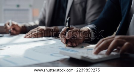 Accounting fund managers meeting to planning to improve quality next year team consultation investment stock market analysis and checking document, investigation of corruption account. anti bribery Royalty-Free Stock Photo #2239859275