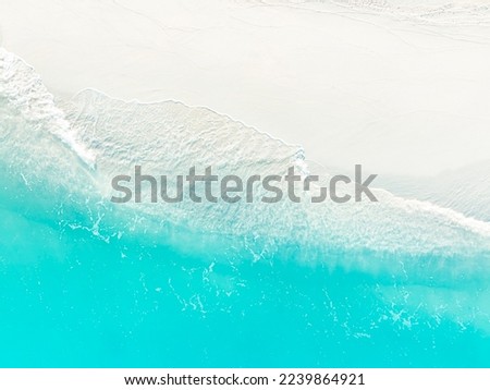 The ecology with Waves on the beach as a background. Beautiful natural background at the summer time-above view