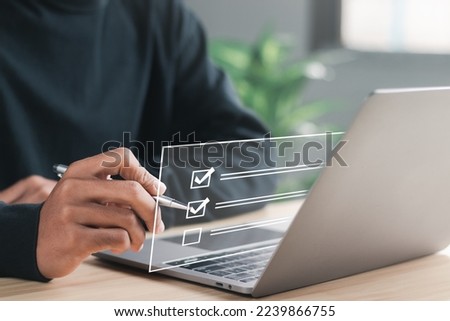 Questionnaire with checkboxes, filling survey form online, answer questions of test. Survey form concept. Education futuristic technology and learning concept. Royalty-Free Stock Photo #2239866755
