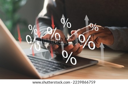 Percentage icons and up and down arrow icons with graph indicators on interface icons. Concept of financial interest rates and mortgage rates. Interest Rates Stocks Finance Ratings Mortgage Rates.
