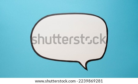 Speech bubble on a blue background. Comic cloud with a place for text Royalty-Free Stock Photo #2239869281