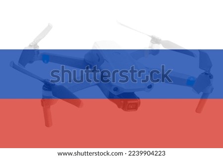 Double exposure of Russian flag and quadcopter drone aerial camera.