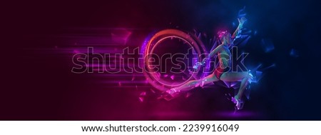 Beauty. Flexible young little girl, female rhythmic gymnast dancing over blue-magent background with abstract geometric neoned elements. Concept of sport life, motivation, competition. Flyer