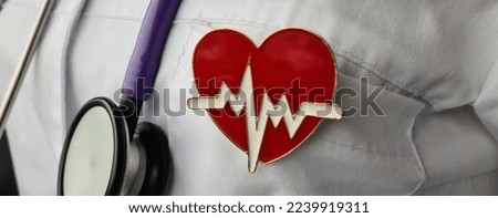 Doctor cardiologist therapist stethoscope heart rate icon with heart. Medical care health insurance