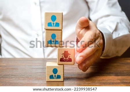 Introduction of a spy into competitor staff. Insert surveillance, informant. Spies and corrupt officials. Industrial and corporate espionage, hunt for commercial secrets. Royalty-Free Stock Photo #2239938547